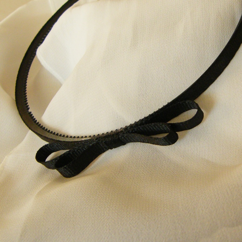 Černá úzká čelenka s mašlí