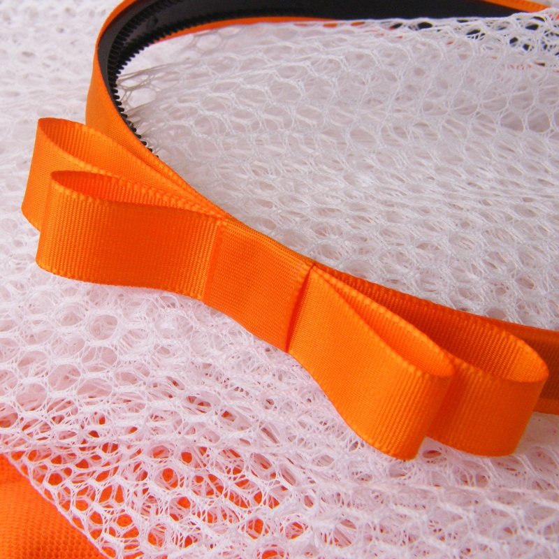 Oranžová čelenka s mašlí