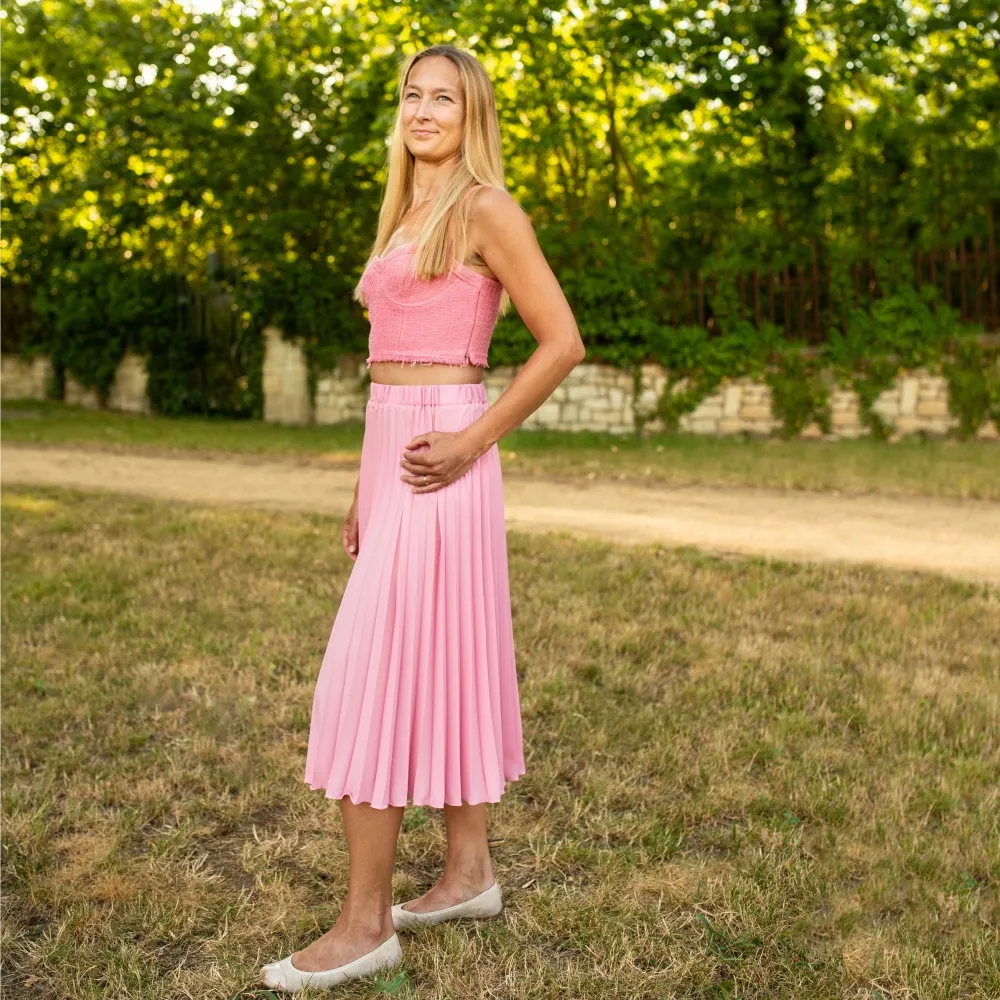 Světle růžová plisovaná sukně