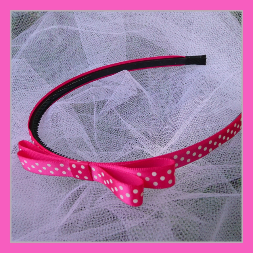 Růžová drobně puntíkovaná čelenka s mašlí