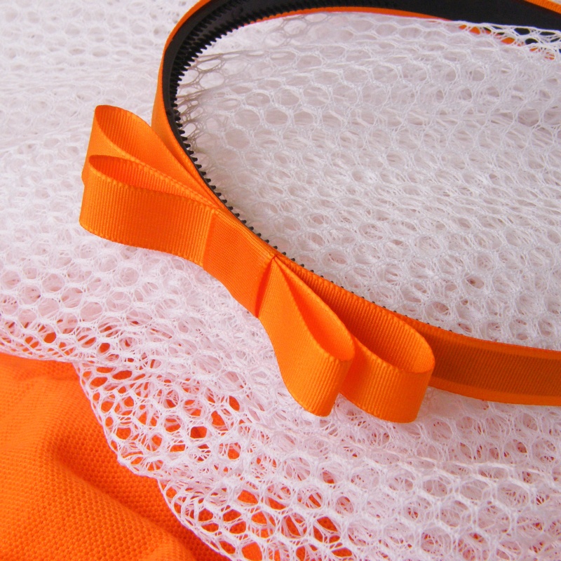 Oranžová čelenka s mašlí