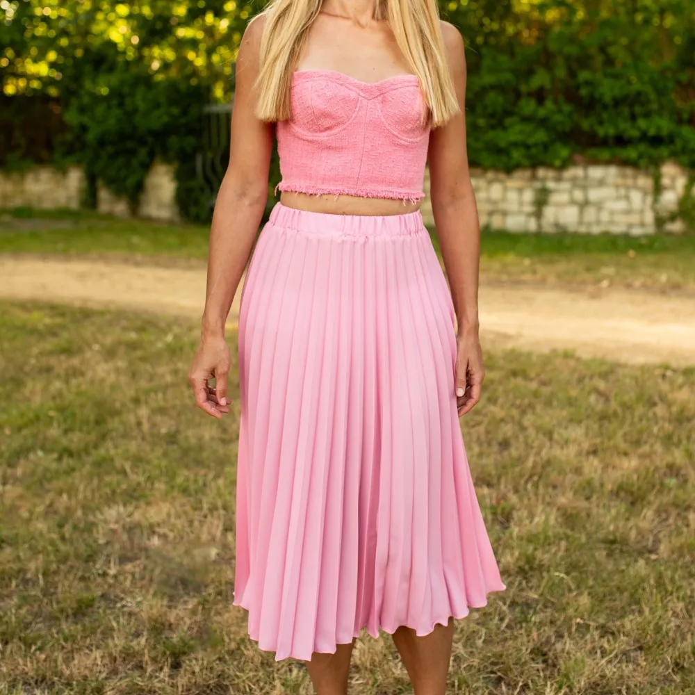 Světle růžová plisovaná sukně