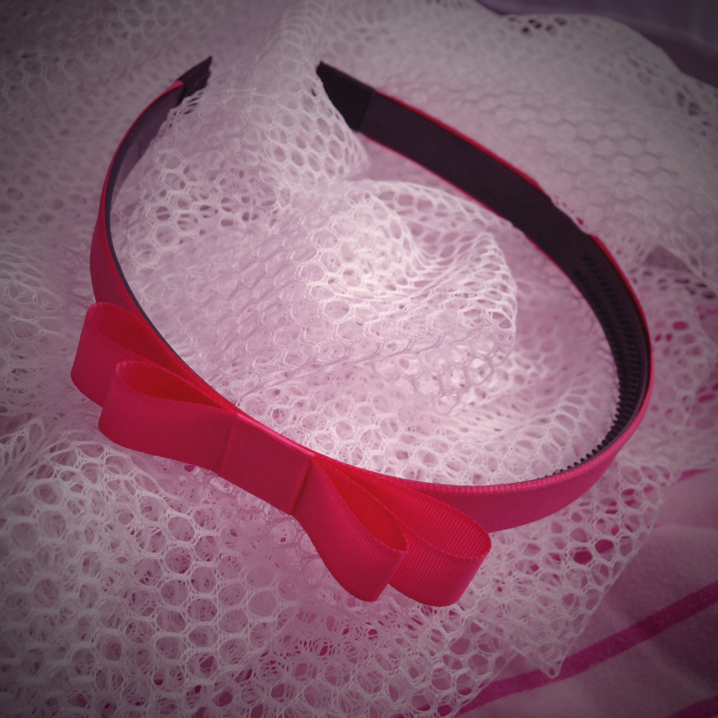 Sytě růžová čelenka s mašlí